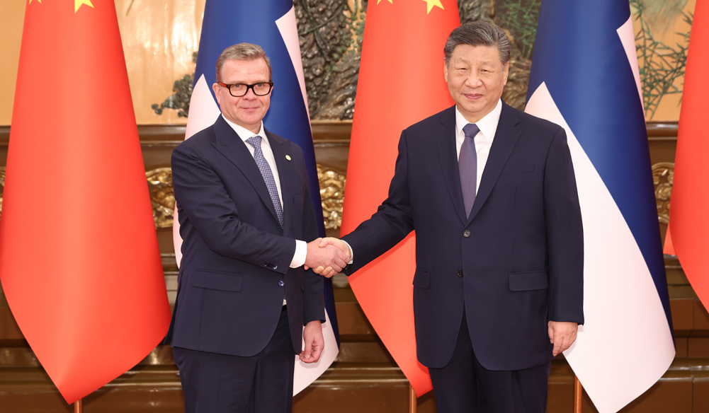 習近平會見芬蘭總理奧爾波